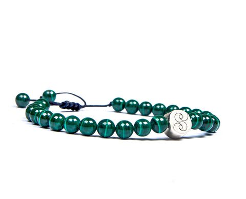 Malachite Stones with iconic silver piece.