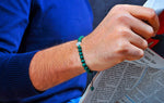 Malachite Stones with iconic silver piece.