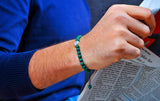Malachite Stones with iconic silver piece.