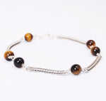 Silver plexus pure tiger eye stones.