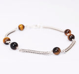 Silver plexus pure tiger eye stones.