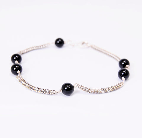 Starling plexus silver with pure onyx stones.
