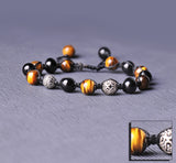 Stunner stitch Bracelet with pure onyx and tiger eye stones.