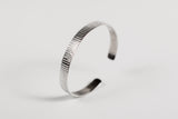Zigzag style silver cuff bracelet.